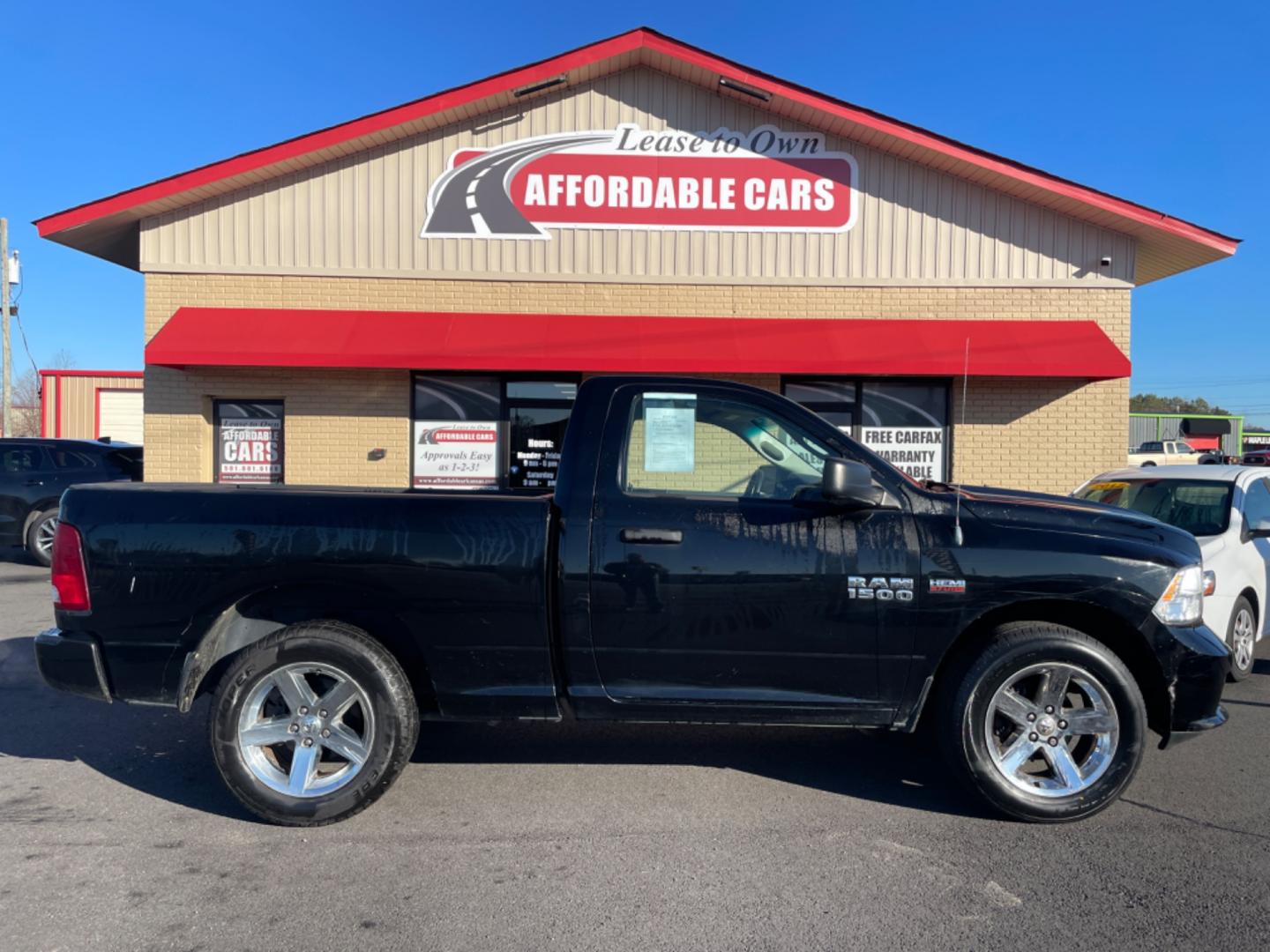 2014 Black Ram 1500 Regular Cab (3C6JR6AT1EG) with an V8, HEMI, 5.7 Liter engine, Automatic, 8-Spd transmission, located at 8008 Warden Rd, Sherwood, AR, 72120, (501) 801-6100, 34.830078, -92.186684 - Photo#0